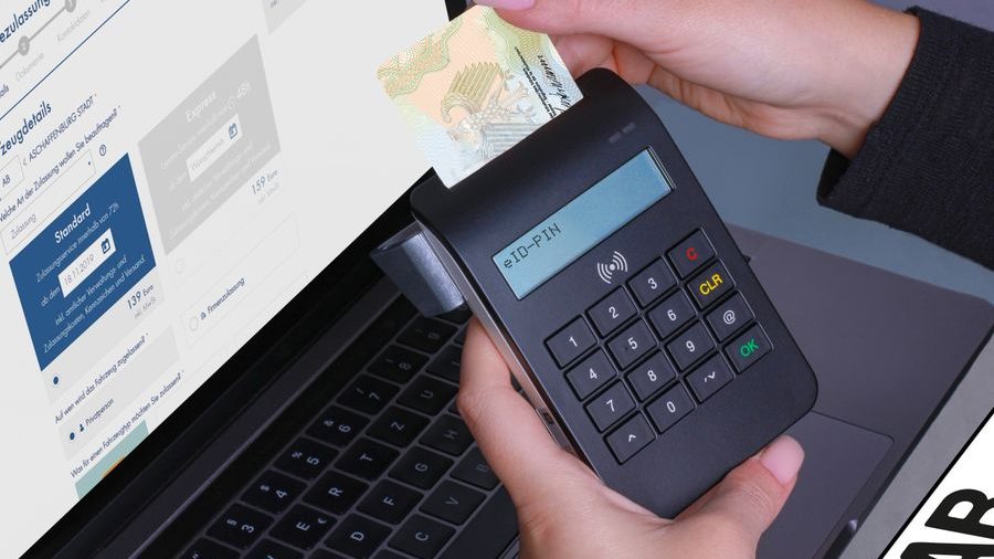A card terminal connected to a laptop running business software